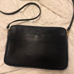 Clare V. Marisol in perforated navy leather.